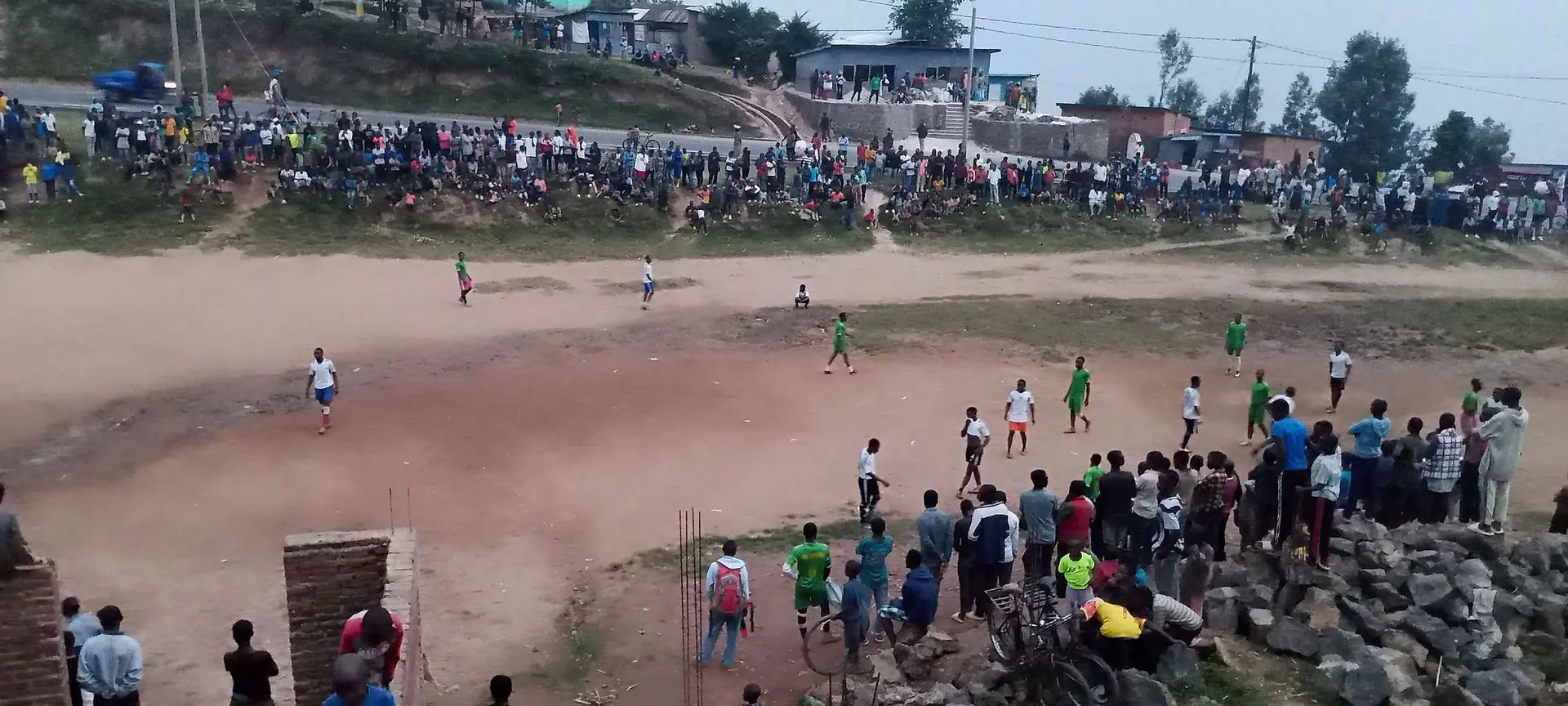 Crowds lining the field during a tournament match