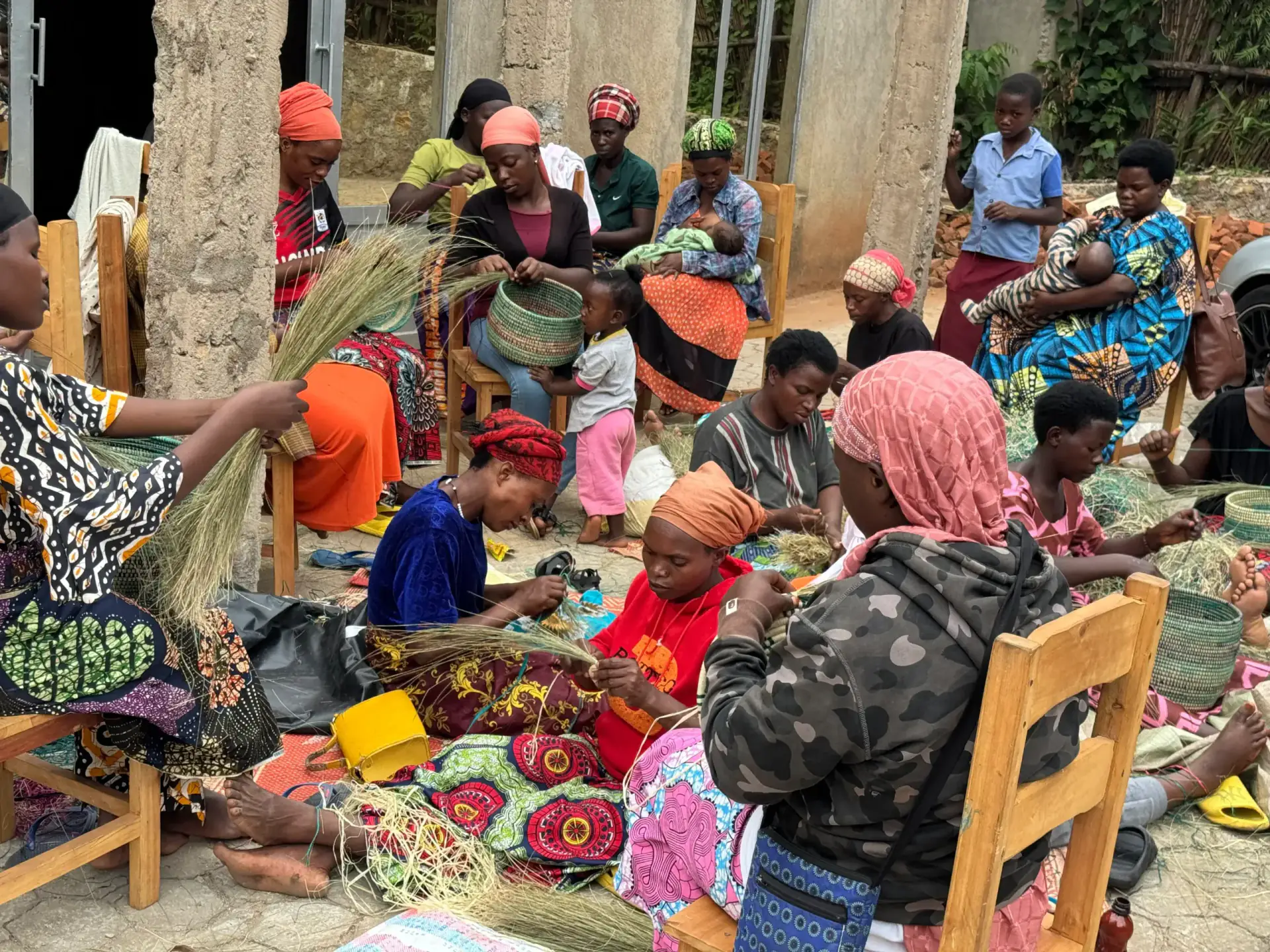 Women weaving together in a circle